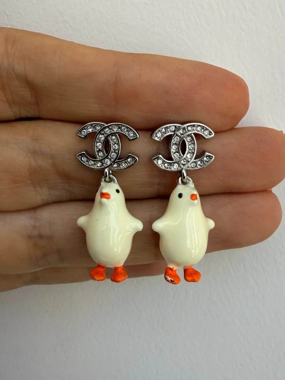 CHANEL White Enamel Chicken CC Drop Earrings with Orange Accents